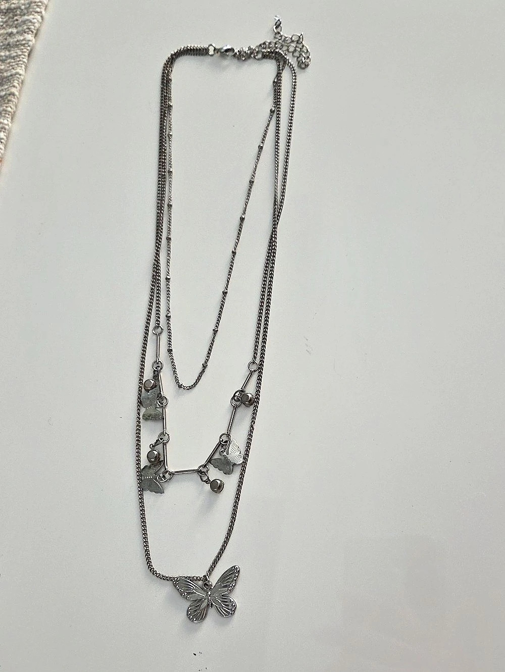 Layered Butterfly Pendant Necklace in Silver Like New